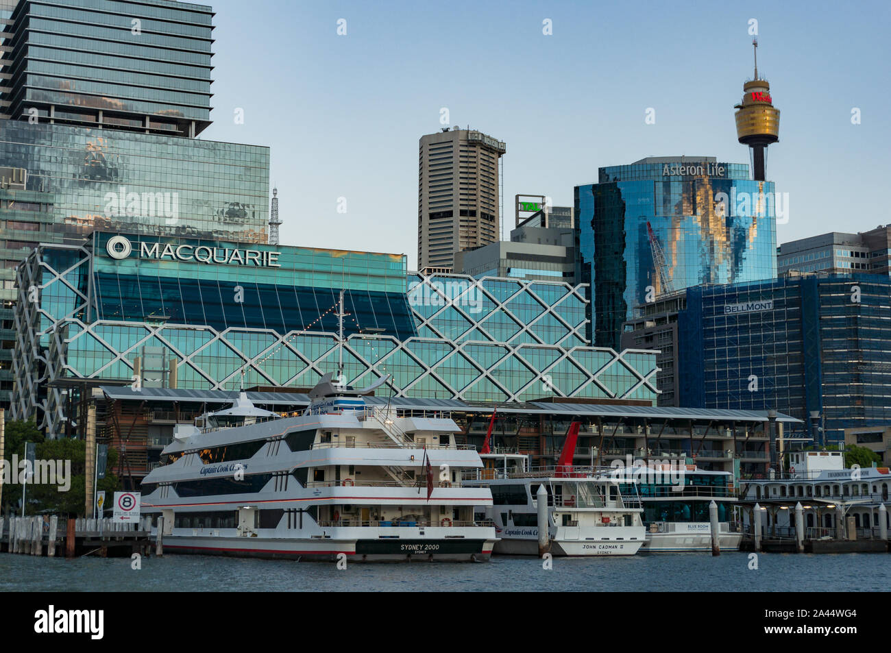 Sydney, Australia - November 13, 2016: King Street Wharf with Sydney Central Business District skyline and Captain Cook Cruises Boat on pier Stock Photo