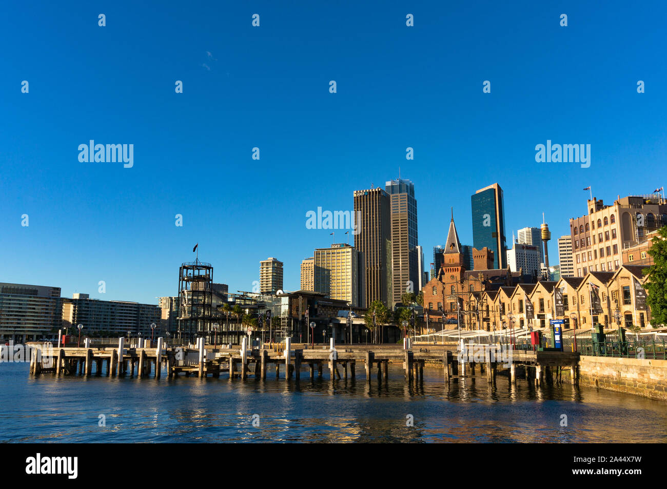 Sydney, Australia - Jul 23, 2016: Campbells Cove Jetty and Sydney Central Business District skyline in The Rocks precinct, which has State heritage si Stock Photo