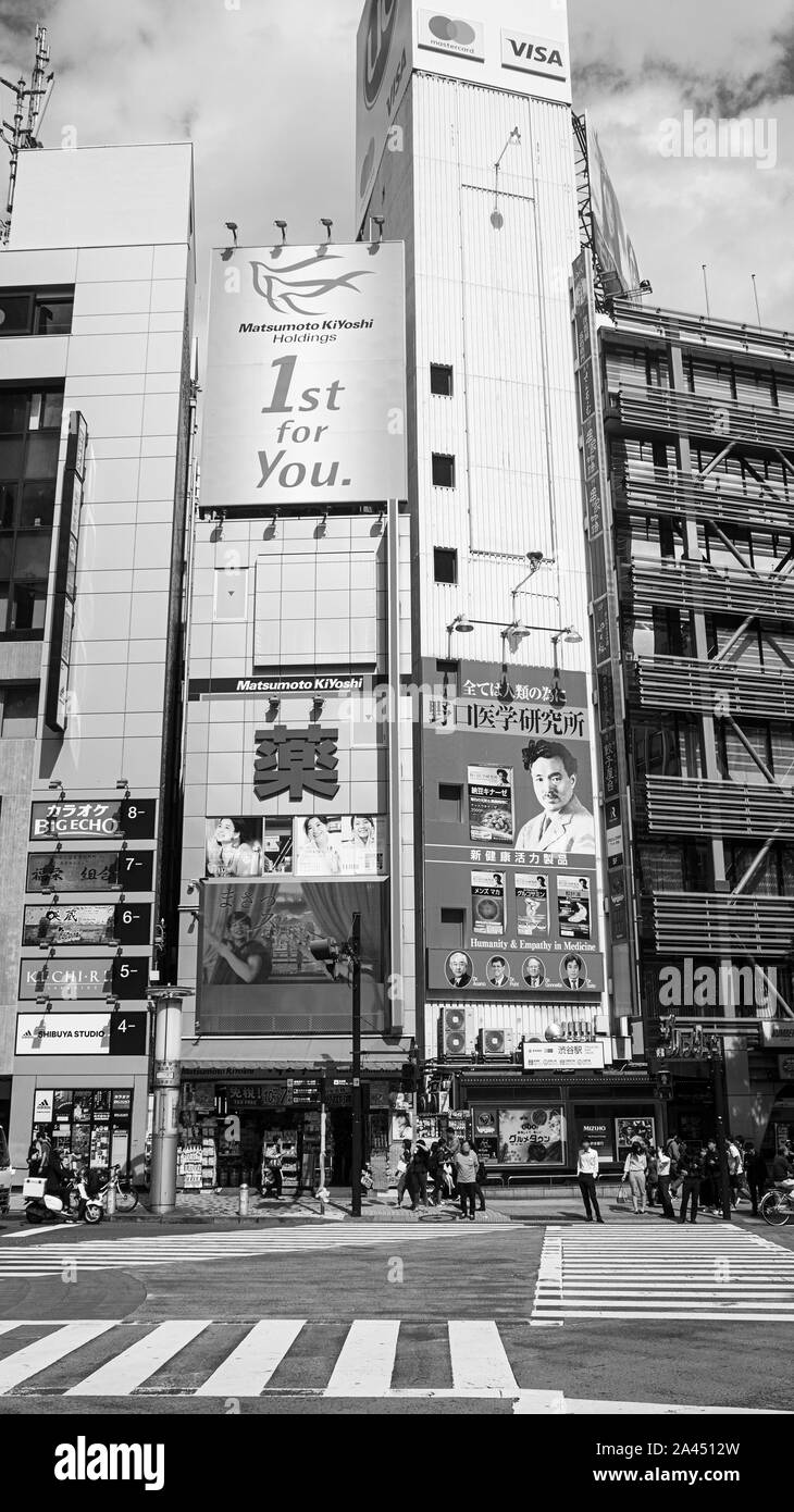 Shibuya Tokyo crosswalk downtown building architecture urban black white Stock Photo