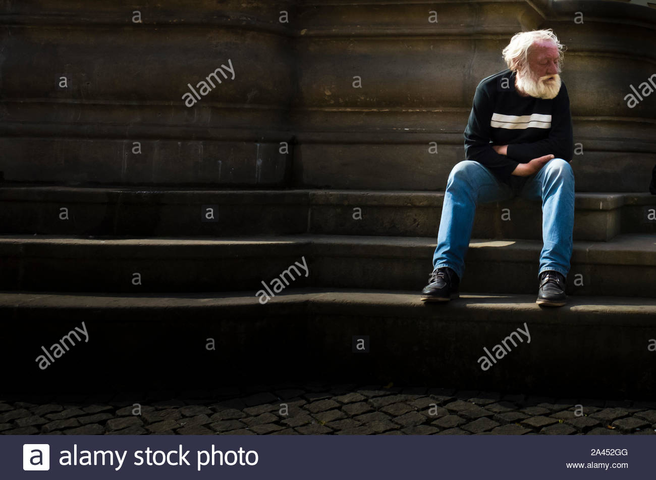 Homeless Man With White Hair And Beard Stock Photo