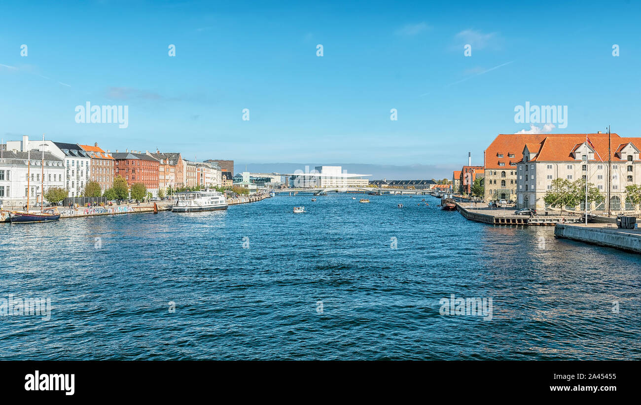 COPENHAGEN, DENMARK - SEPTEMBER 21, 2019: A panoramic image of the river with the famous opera house in the distance Stock Photo