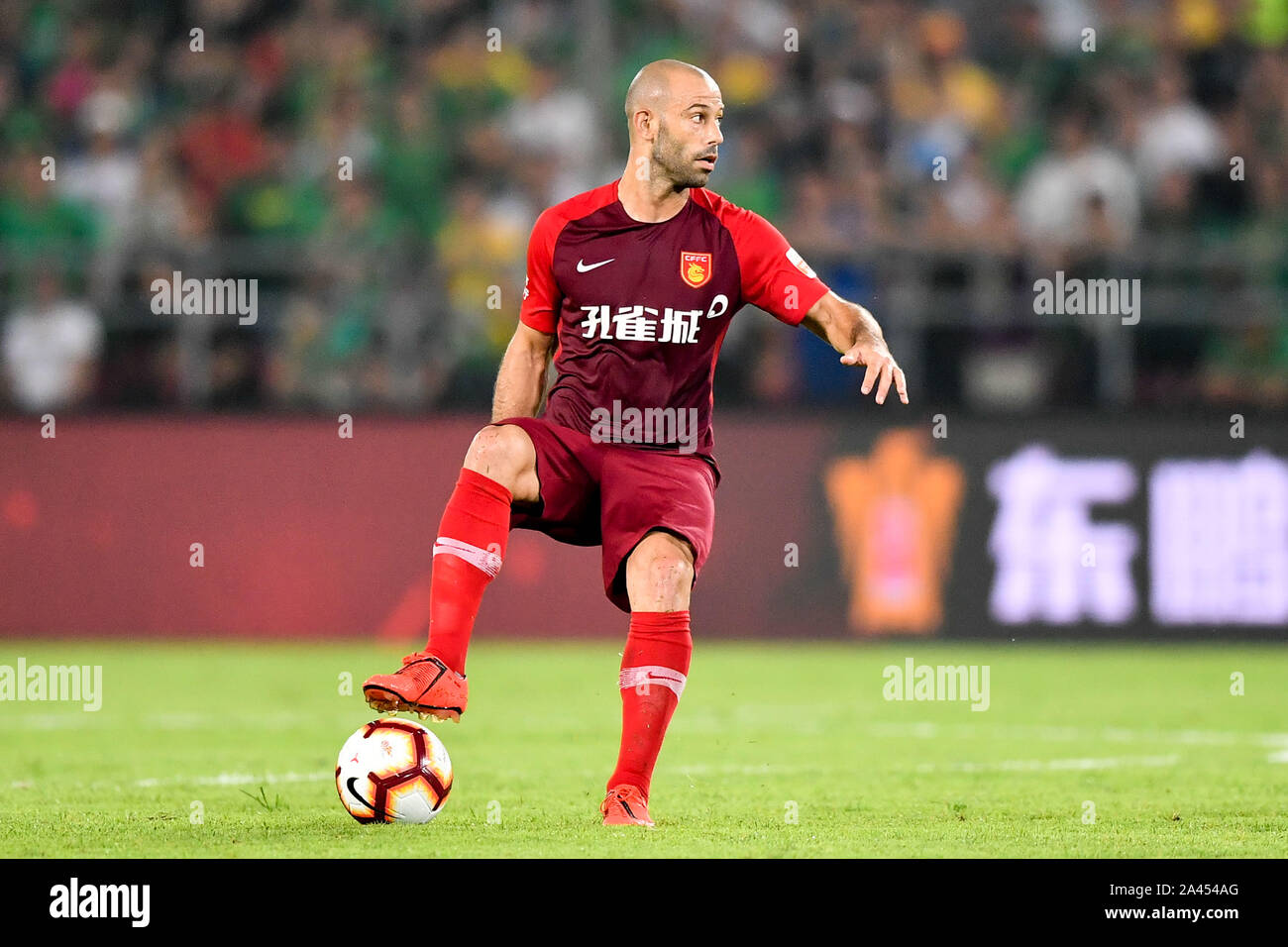 Argentine football player Javier Mascherano of Hebei China Fortune F.C.  keeps the ball during the 21st round of Chinese Football Association Super  Lea Stock Photo - Alamy