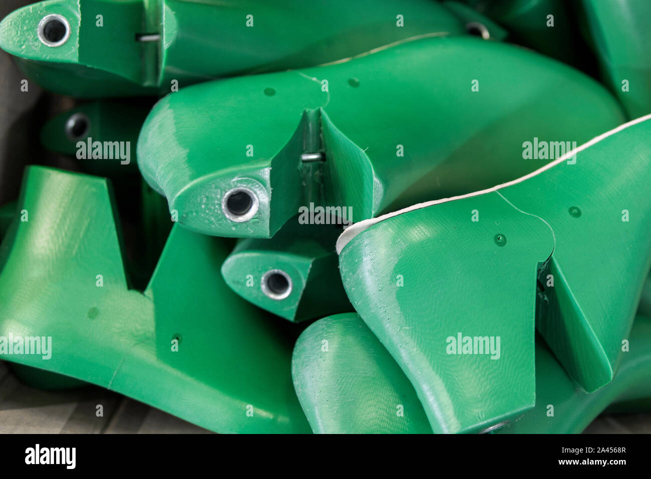 Plastic lasts used in the manufacture of shoes. Row of plastic shoe