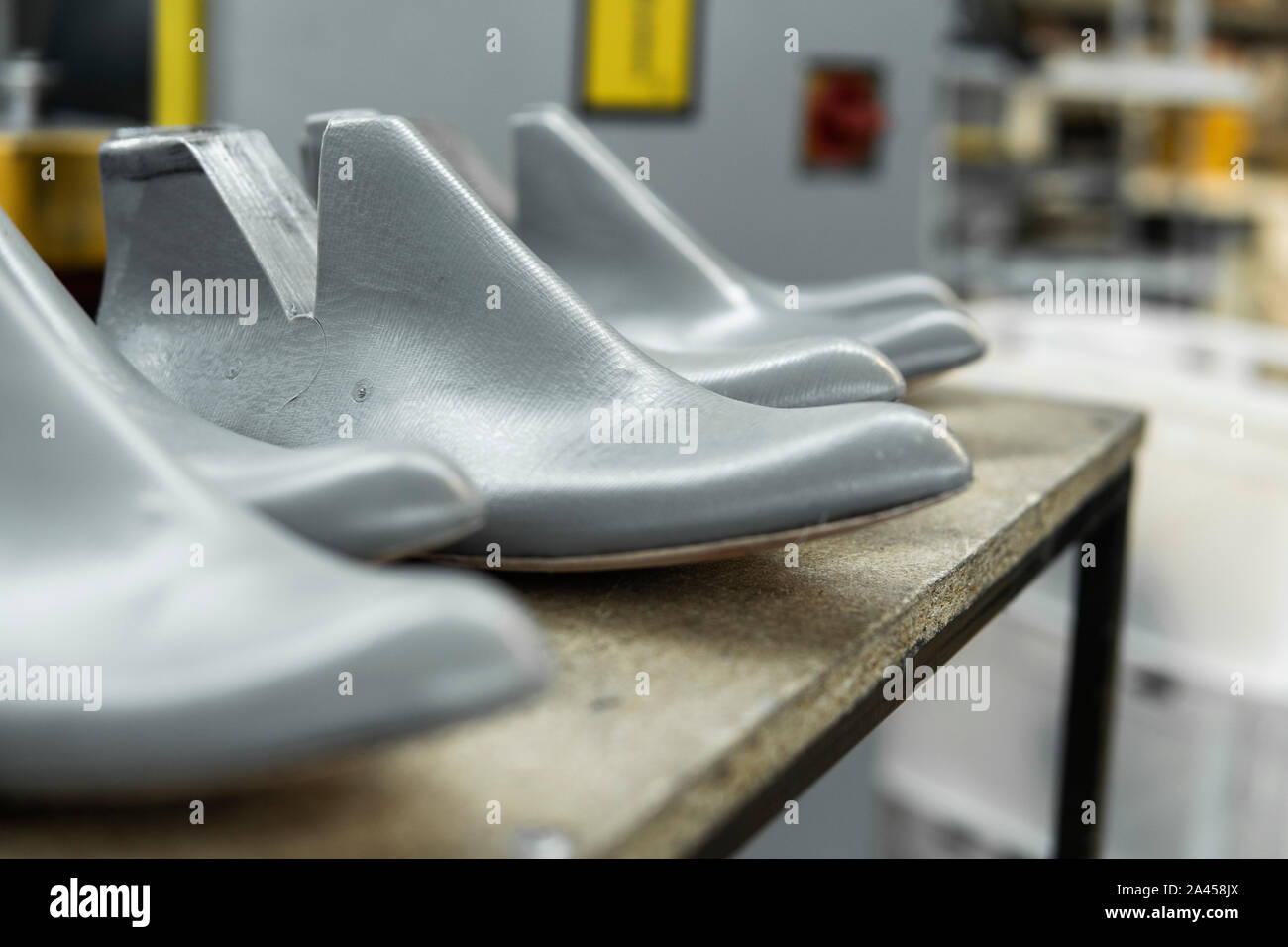 Plastic lasts used in the manufacture of shoes. Row of plastic shoe