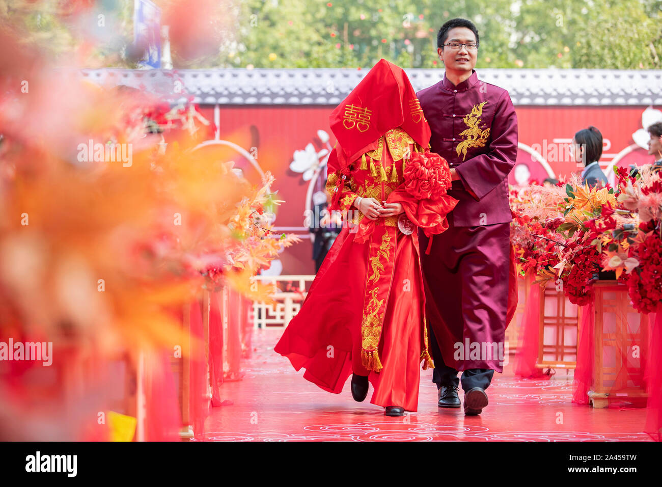 Chinese wedding couple in traditional hires stock photography and