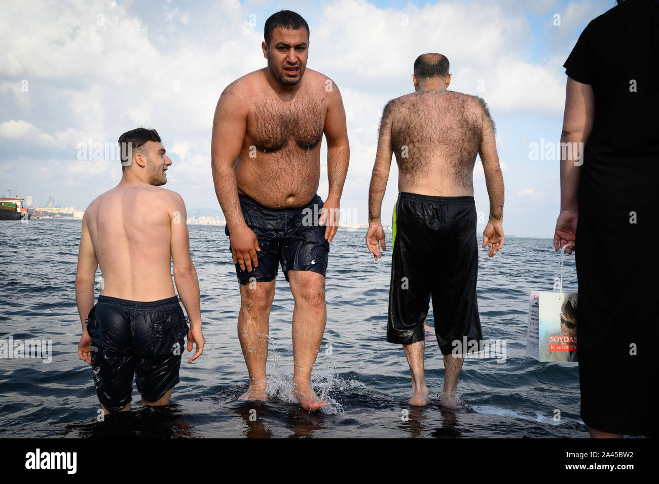 Hairy men on the shore of the Sea of Marmara, Istanbul, Turkey Stock Photo  - Alamy