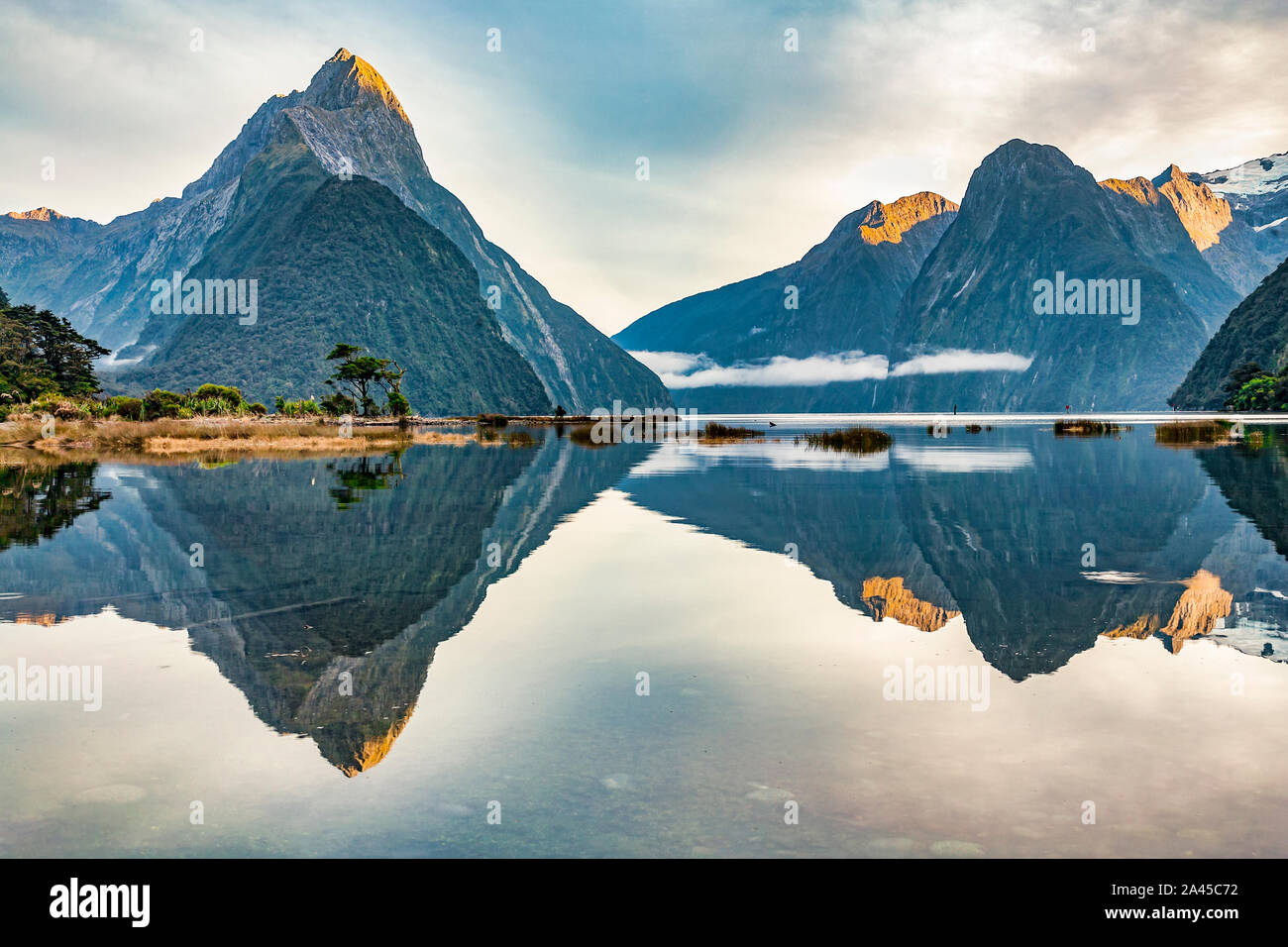 Milford Sound, probably New Zealand's most famous tourist destination, on a beautiful calm sunny morning. Stock Photo
