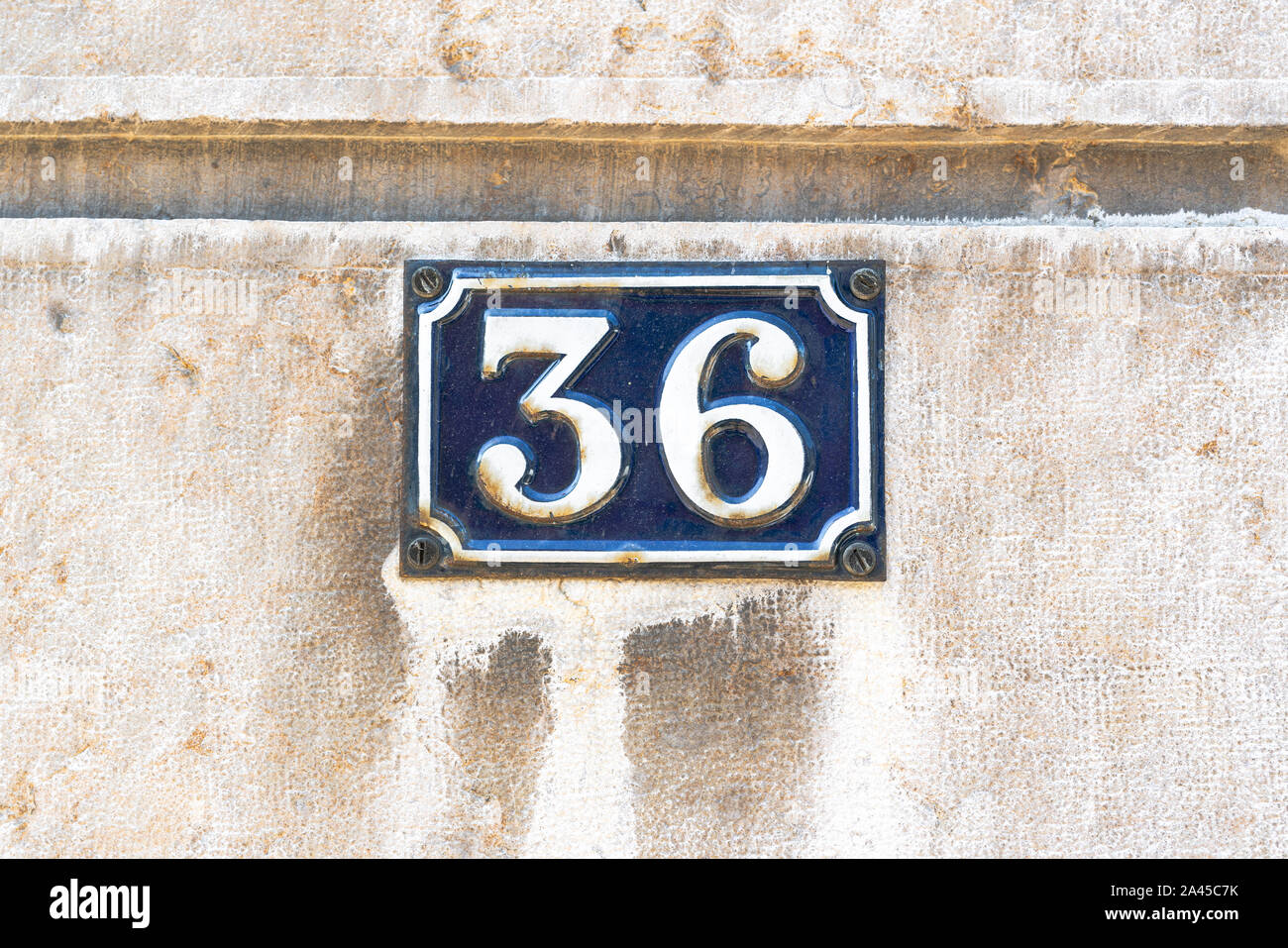 Enameled house number thirty six (36) Stock Photo