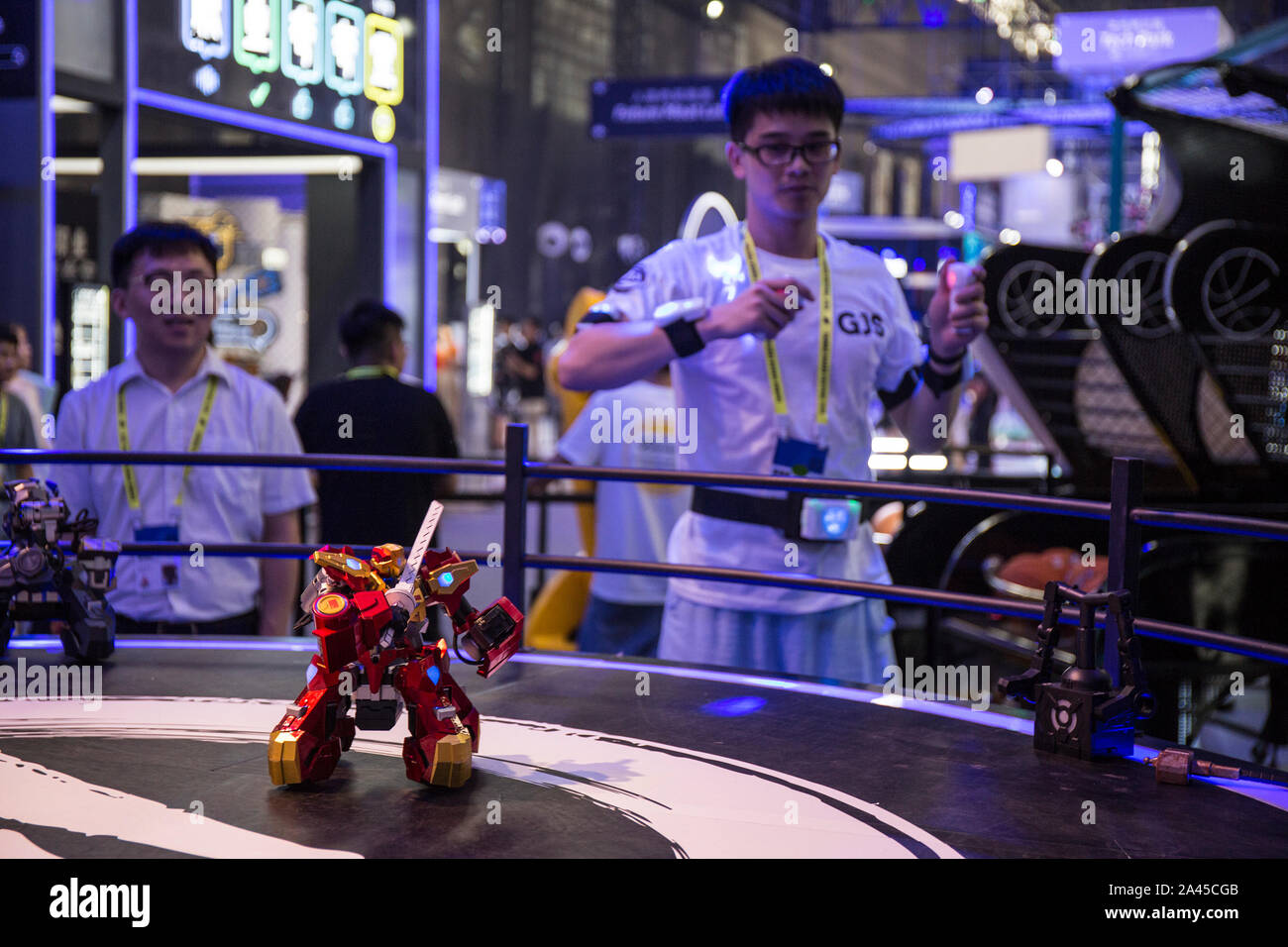 A staff controls a motion sensory robot at the Taobao Maker Festival held  by Taobao, a Chinese online shopping website owned by Alibaba Group in  Hangz Stock Photo - Alamy