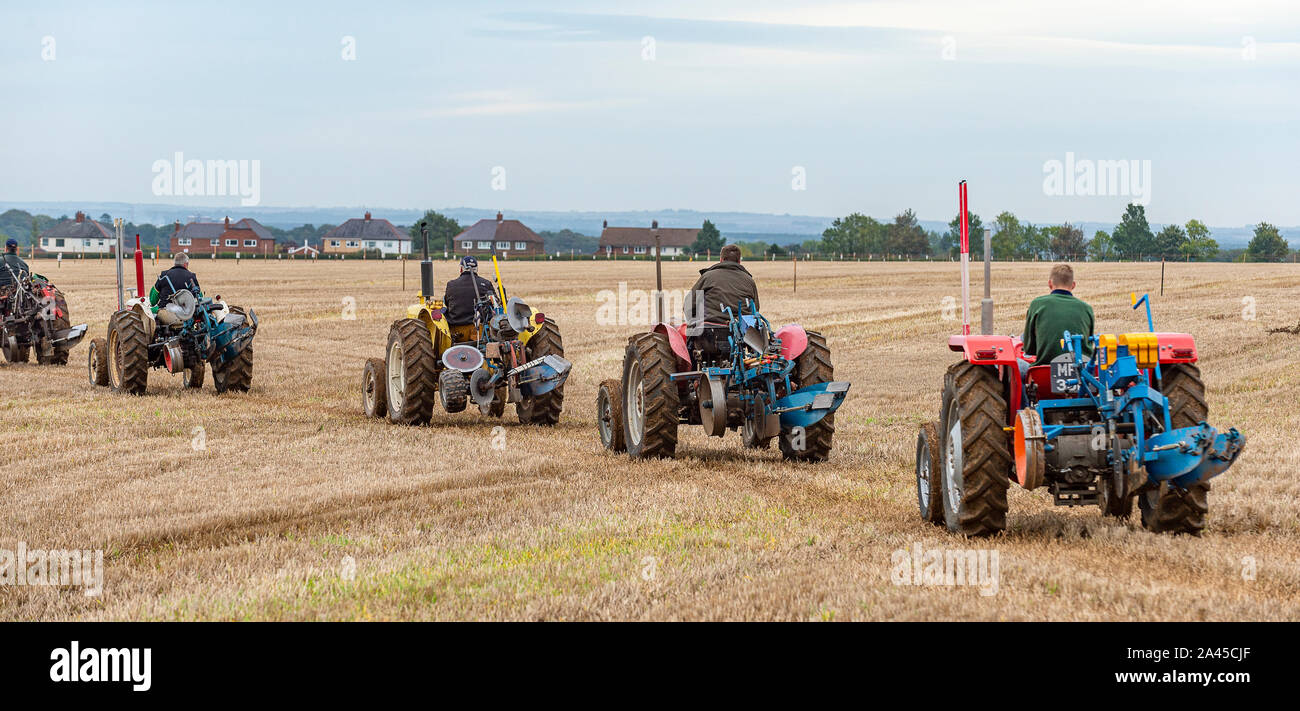 Nocton, Lincoln, Lincolnshire, UK. 12th October 2019.    Over 200 champion ploughmen and women from all over the country have assembled near Lincoln to compete in the 2019 British National Ploughing Championships.  The competition includes many types of plough and styles of ploughing across the 250-acre site; including heavy horses, vintage tractors and steam ploughing engines.  The championships, now in there 69th year, are organised by The Society of Ploughmen with the objective of promoting and encourage the art, skill and science of ploughing the land. Credit: Matt Limb OBE/Alamy Live News Stock Photo