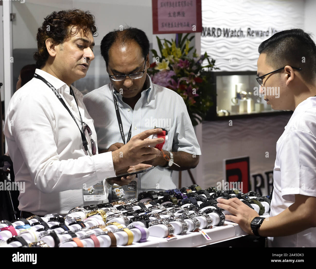 People look at the watches at the 38th Hong Kong Watch and Clock Fair