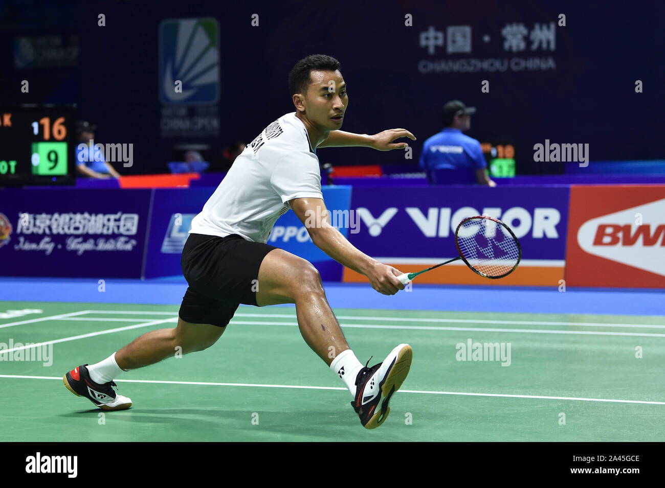 Indonesian professional badminton player Tommy Sugiarto competes