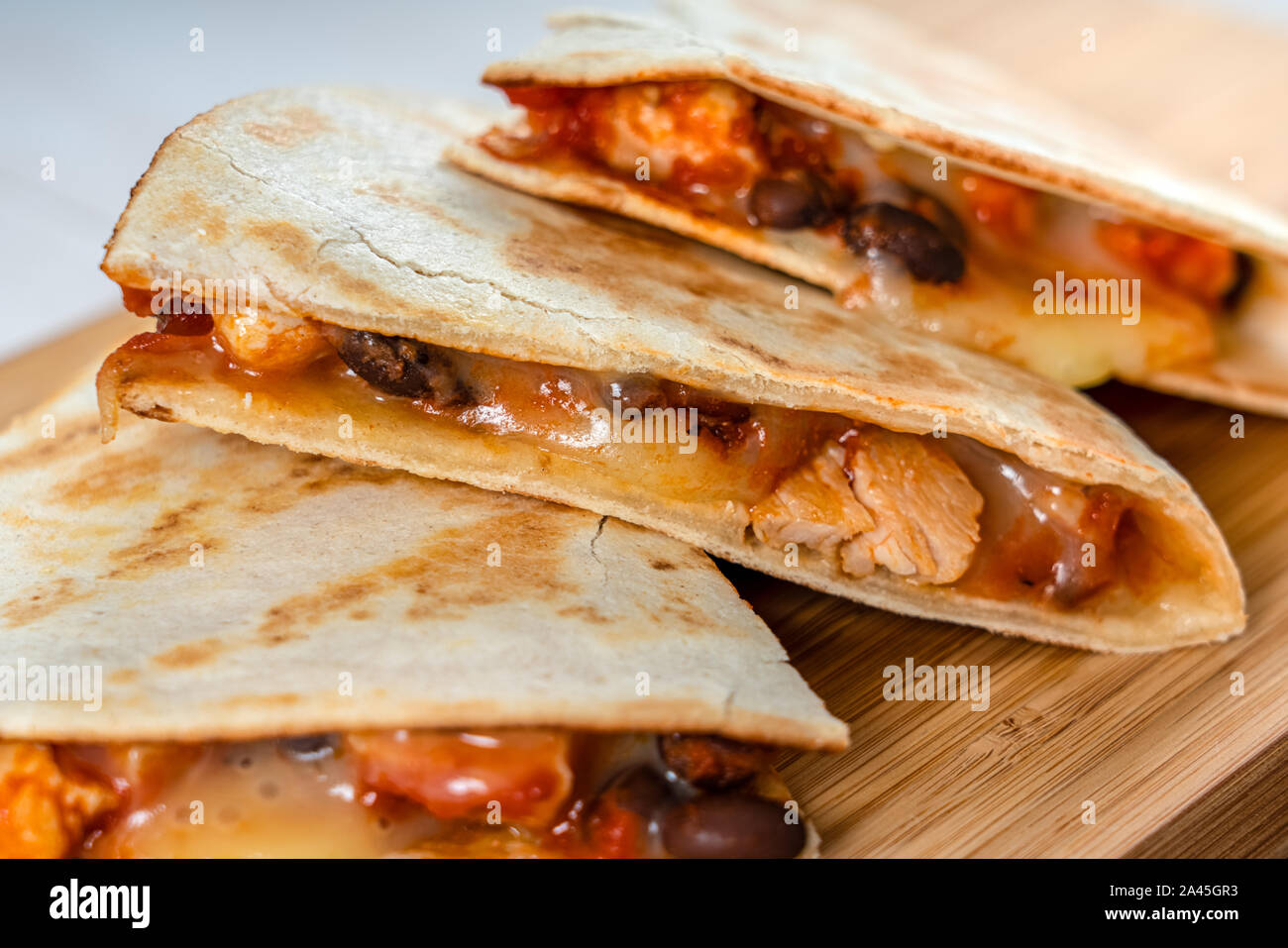 Chicken And Black Beans Quesadillas With Cheese And Salsa Stock Photo
