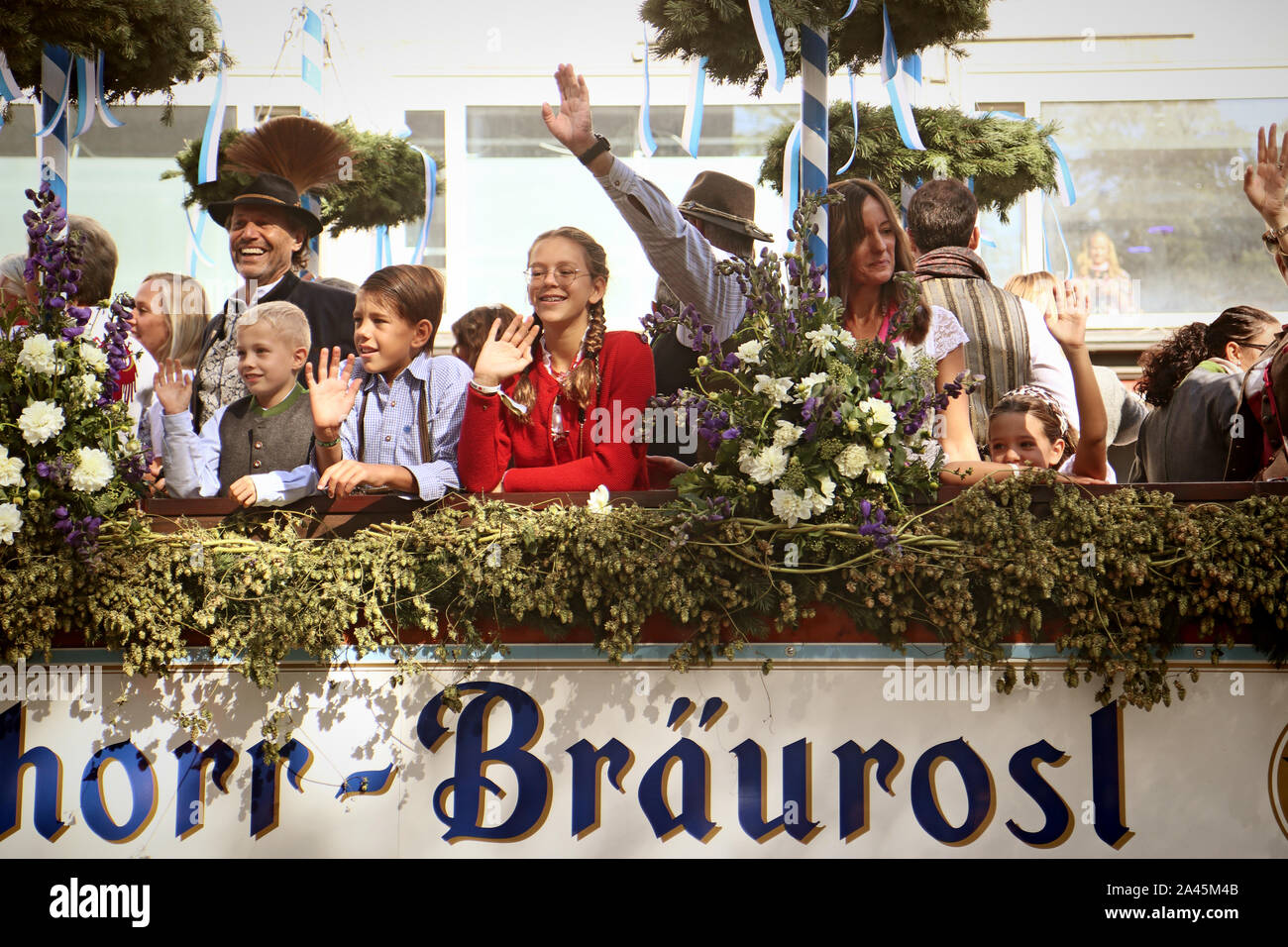 MUNICH, GERMANY - SEPTEMBER 22, 2019 Grand entry of the Oktoberfest landlords and breweries, festive parade of magnificent decorated carriages and ban Stock Photo