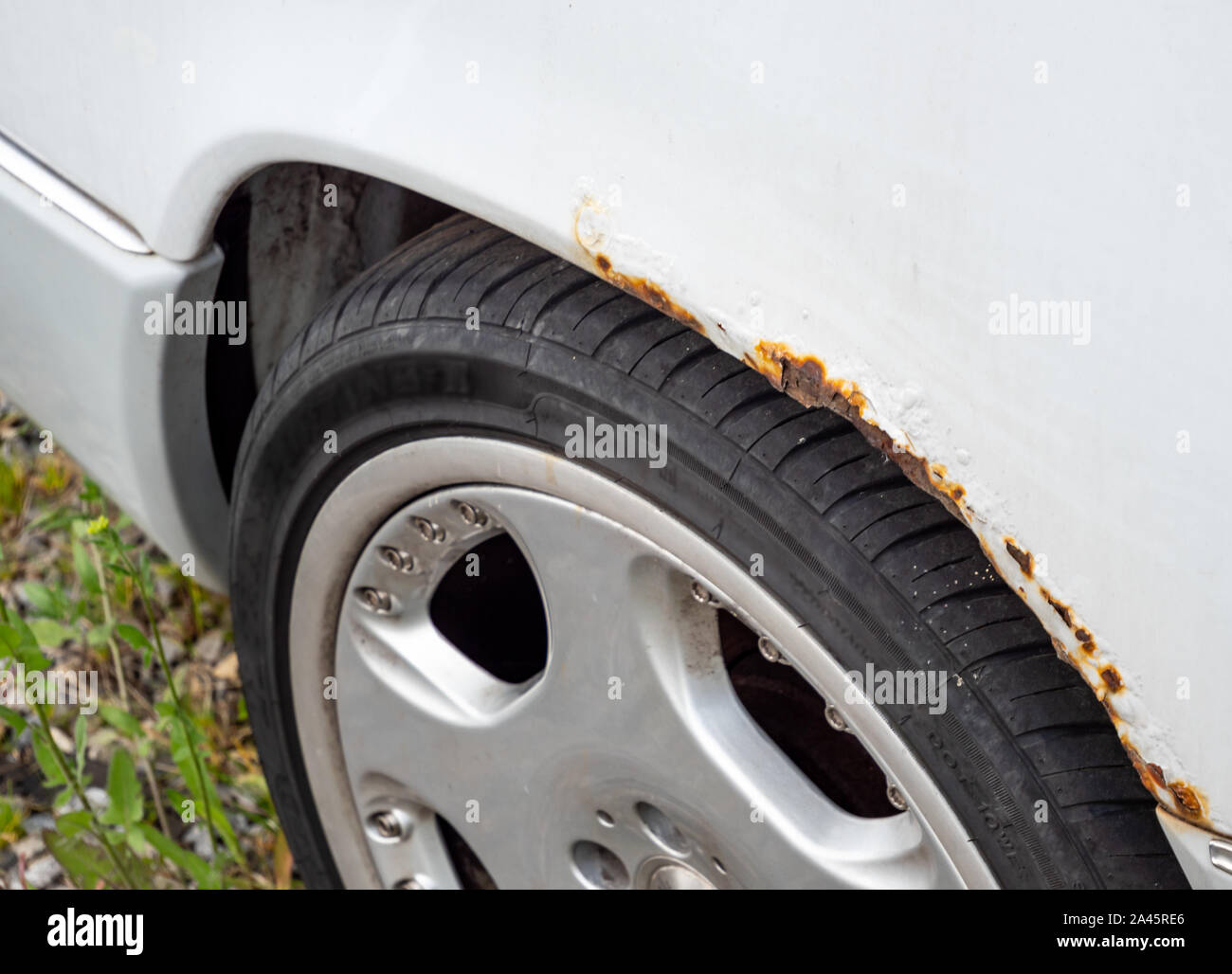 Rust on fender car repair Stock Photo Alamy
