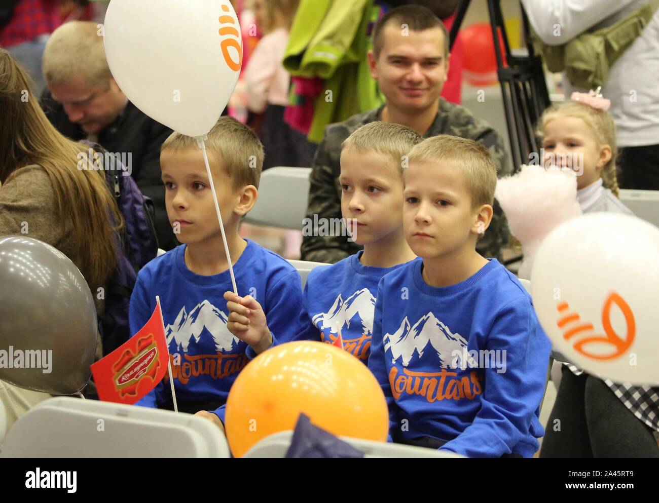 Minsk, Belarus. 12th Oct, 2019. Triplet brothers take part in a festival of twins held in Minsk, Belarus, Oct. 12, 2019. A total of 150 families of twins and multiples took part in the event. Credit: Henadz Zhinkov/Xinhua/Alamy Live News Stock Photo