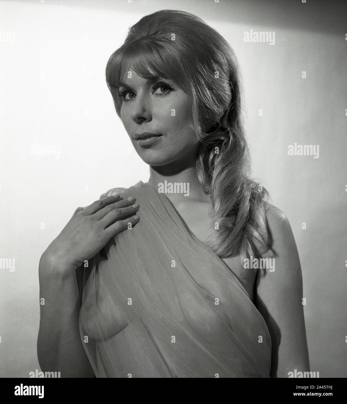 1960's photoshoot Female Model Classically Dressed like a Roman or Greek Goddess, c1969  Photo by Tony Henshaw Archive Stock Photo