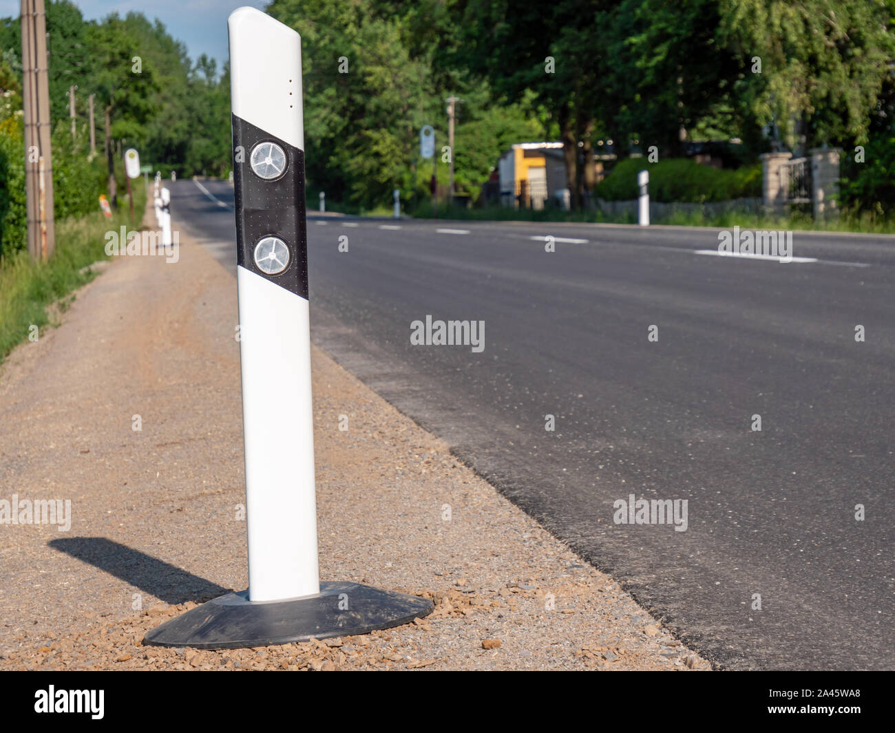 New road surface with delineators Stock Photo