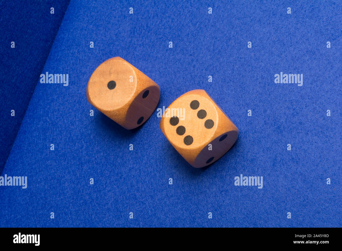 Two gambling dice showing a five and a two Stock Photo
