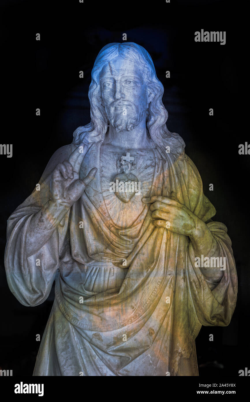 The Sacred Heart of Jesus. Color filters and enhancements applied.  The Christian religious symbol is located in the colonial Catholic church in Sagua Stock Photo