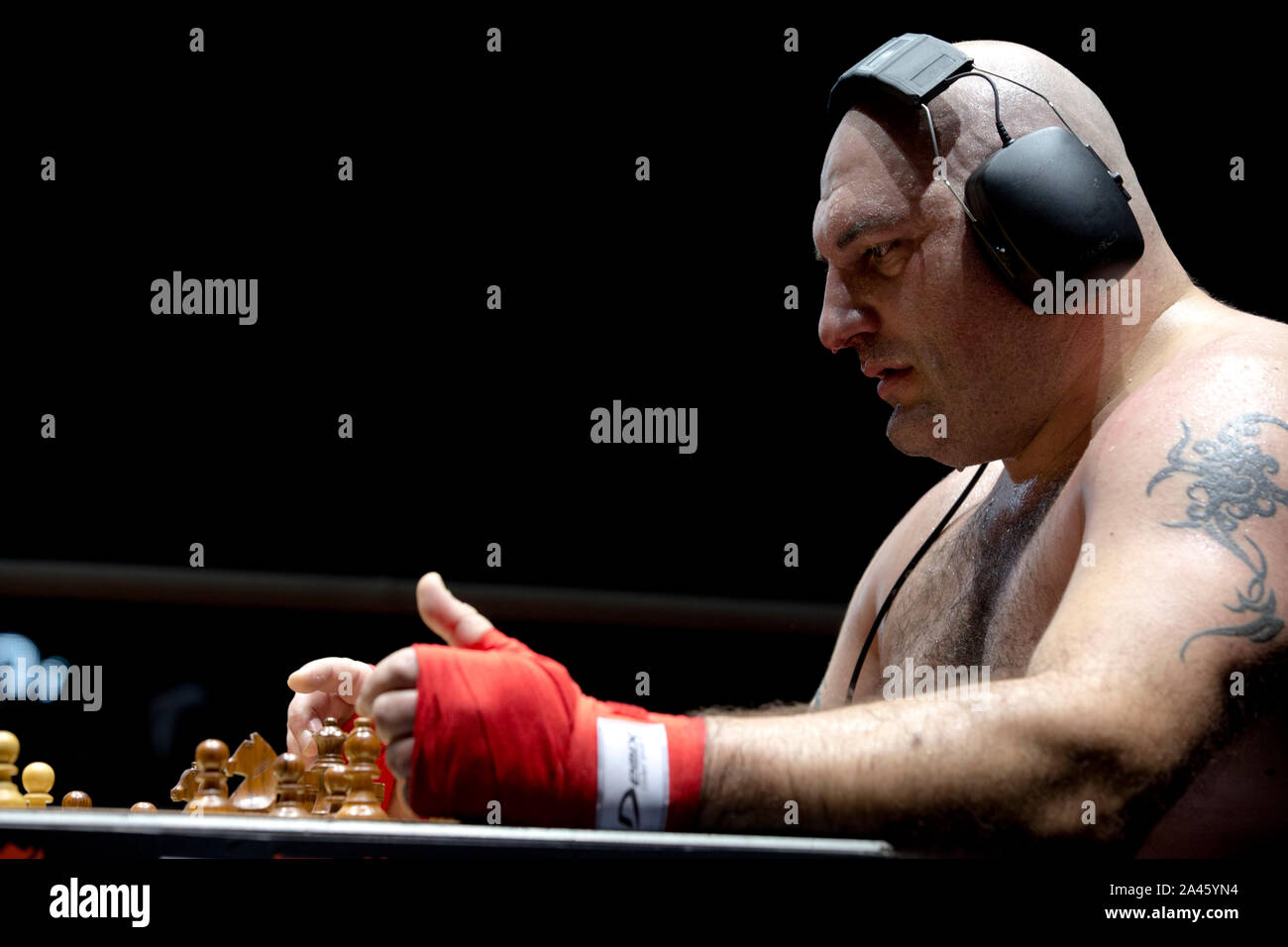 Chessboxing, boxing and chess board game being played alternately as part  of a new surreal sport, Islington, London, UK Stock Photo - Alamy