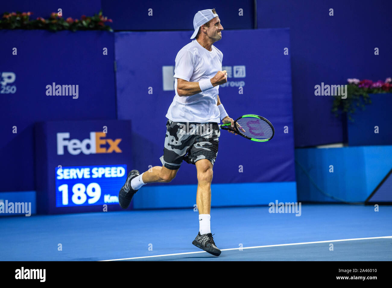 Tennys Sandgren of America celebrates after securing the ball against Andy Murray of England at the first round of Men's Single at the Huajin Securiti Stock Photo