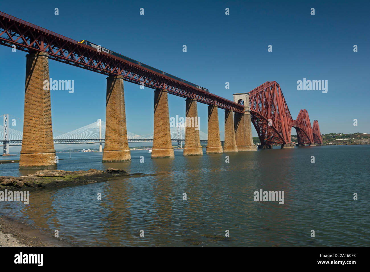The Forth Rail Bridge and two Forth Road Bridges over the River Forth, Scotland Stock Photo