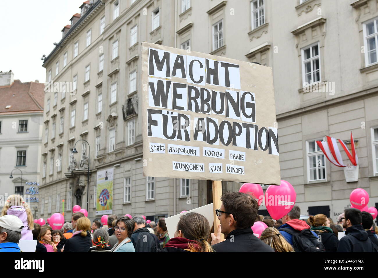 Vienna, Austria. 12th Oct, 2019. Conservative abortion protesters demonstrate again on Saturday, October 12, 2019 in Vienna for the tightening of the 'deadlines regulation'. The 'march for life' is supported by the Archdiocese of Vienna. Banner that reads 'Advertise Adoption'.  Franz Perc / Alamy Live News Stock Photo