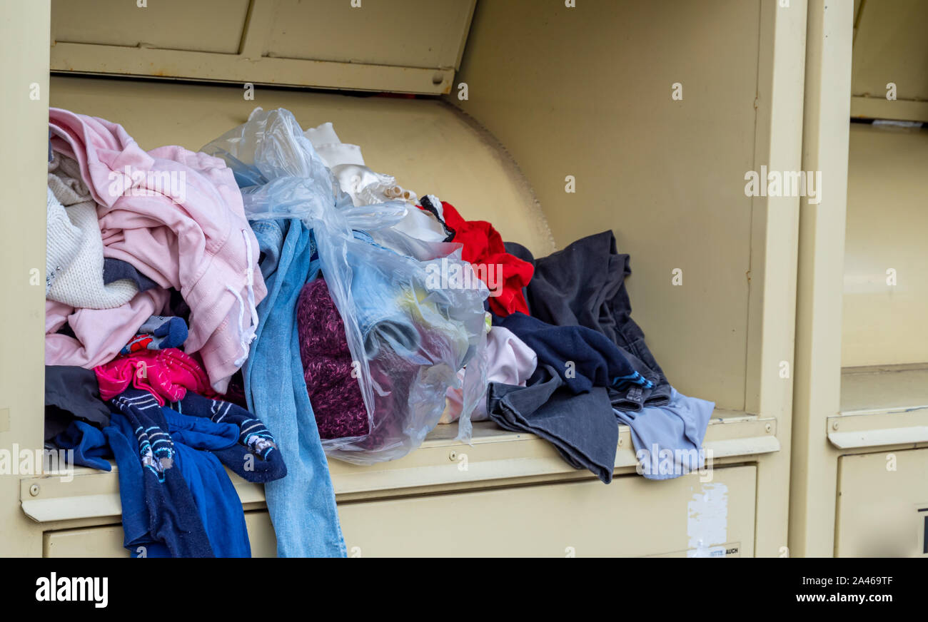 Clothes container is full of clothes Stock Photo Alamy