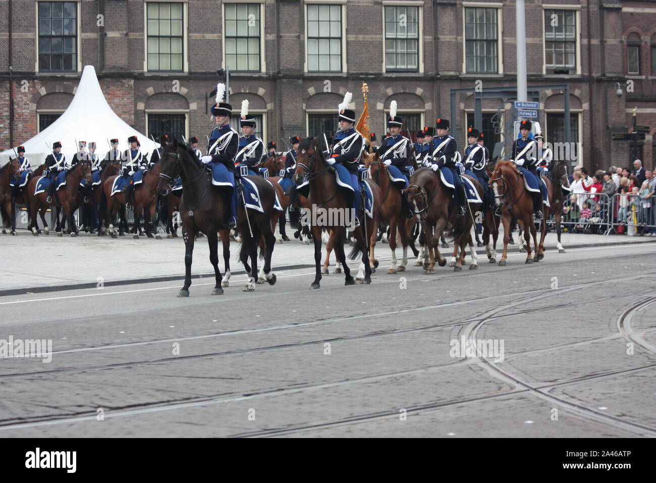 The Cavalry soldiers accompanying the Golden Coach with Queen Beatrix left the parliament house for Noordeinde Palace on Prinsjesdag in Den Haag Stock Photo