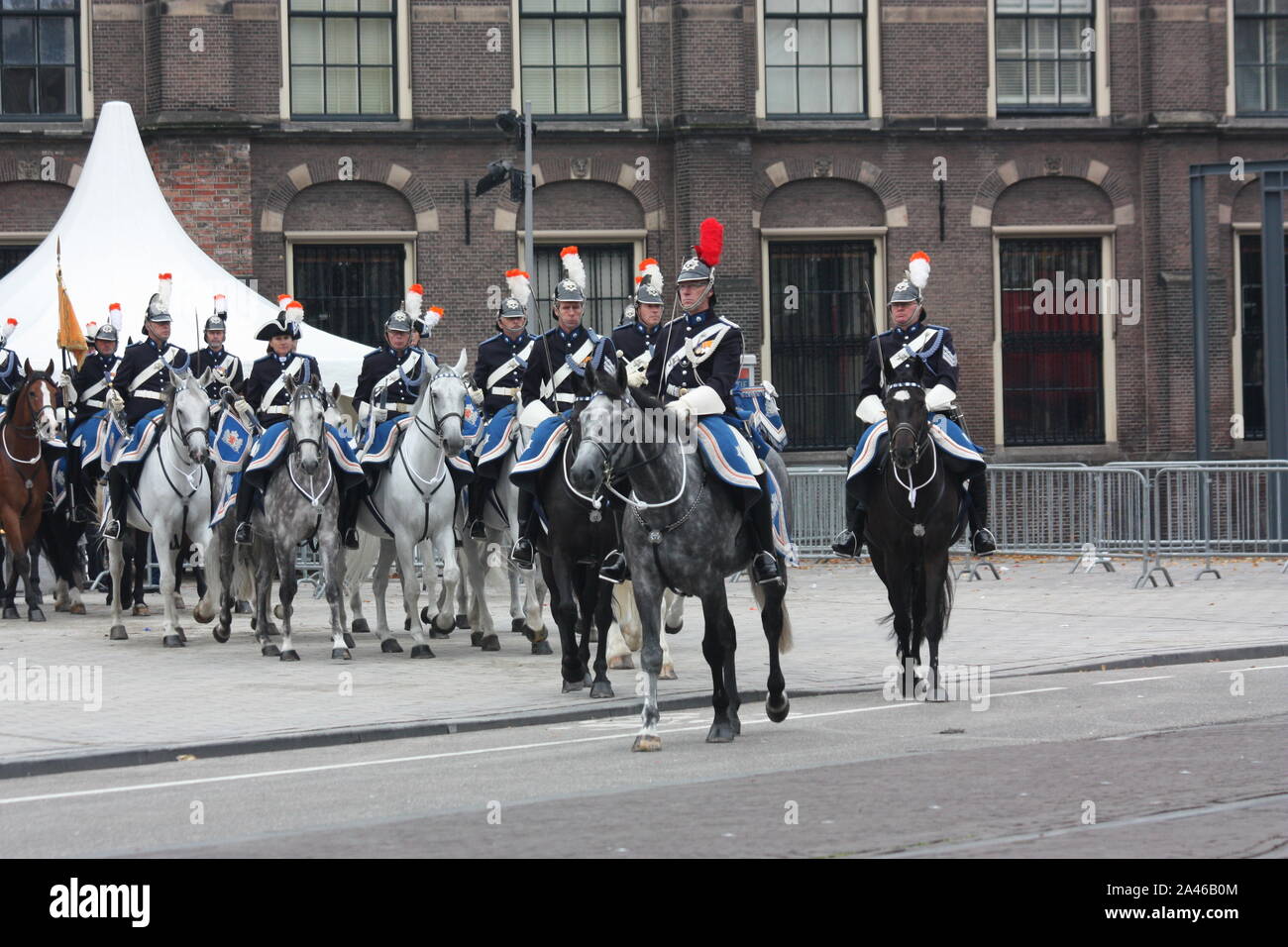 The soldiers on horses left the Binnehof for Noordeinde Palace in The Hague after The Prinsjesdag ceremony. Stock Photo