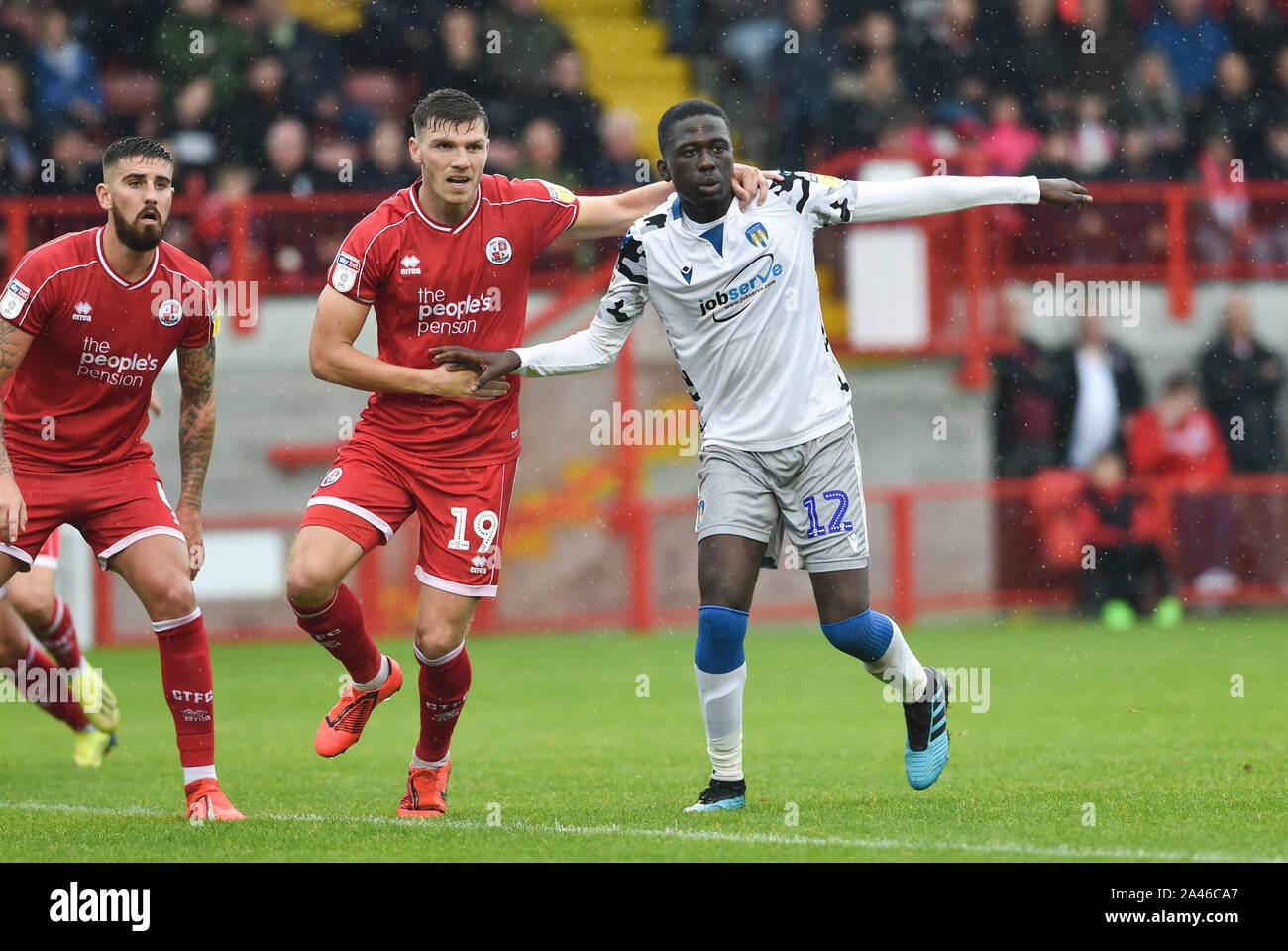 Crawley UK 12 October 2019 - Jordan Tunnicliffe of Crawley (left) with Brendan Sarpong-Wiredu of Colchester during the Skybet League Two match between Crawley Town and Colchester United at the People's Pension Stadium . Credit : Simon Dack TPI / Alamy Live News Stock Photo