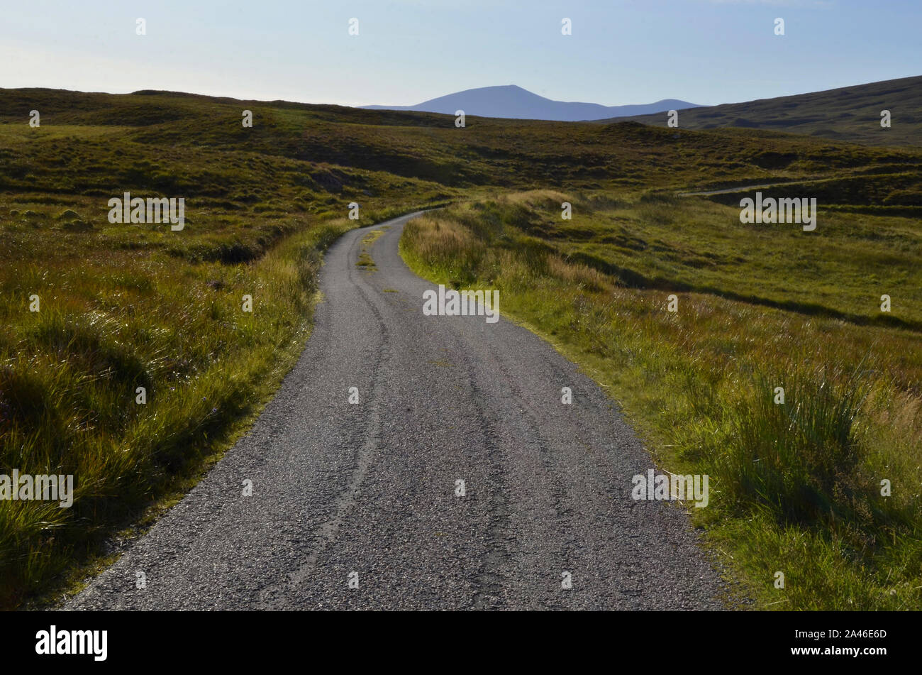 Empty single lane road in the Scottish Highlands of northen Scotland UK Stock Photo