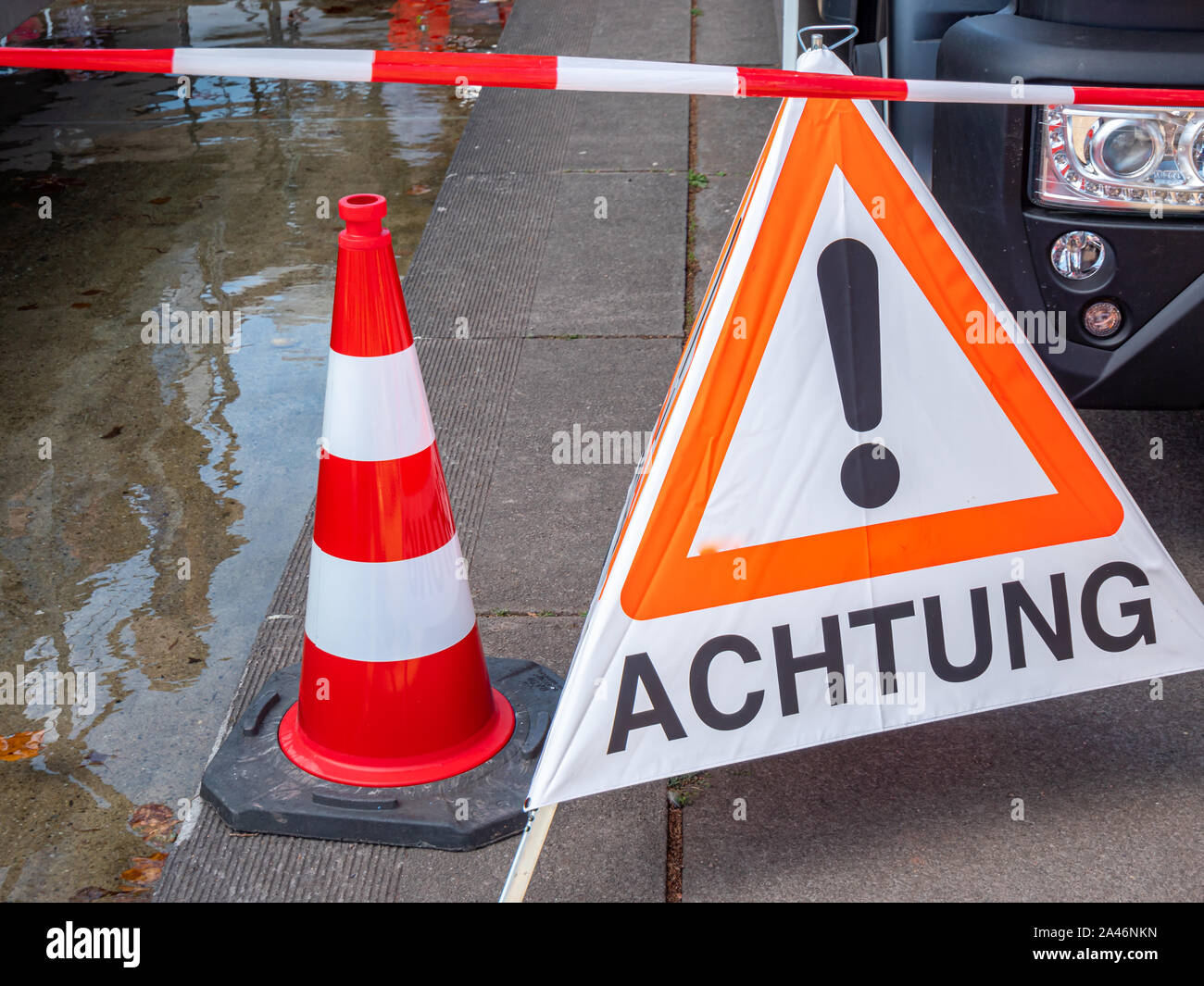 Attention shield Warning Sign in German Stock Photo