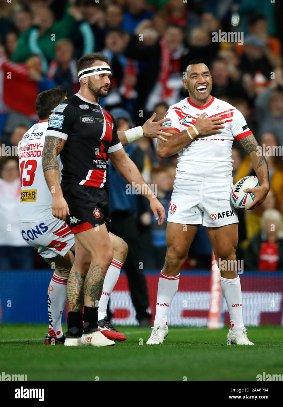 St Helen's Zeb Taia celebrates scoring his side's second try of the game during the Betfred Super League Grand Final at Old Trafford, Manchester. Stock Photo