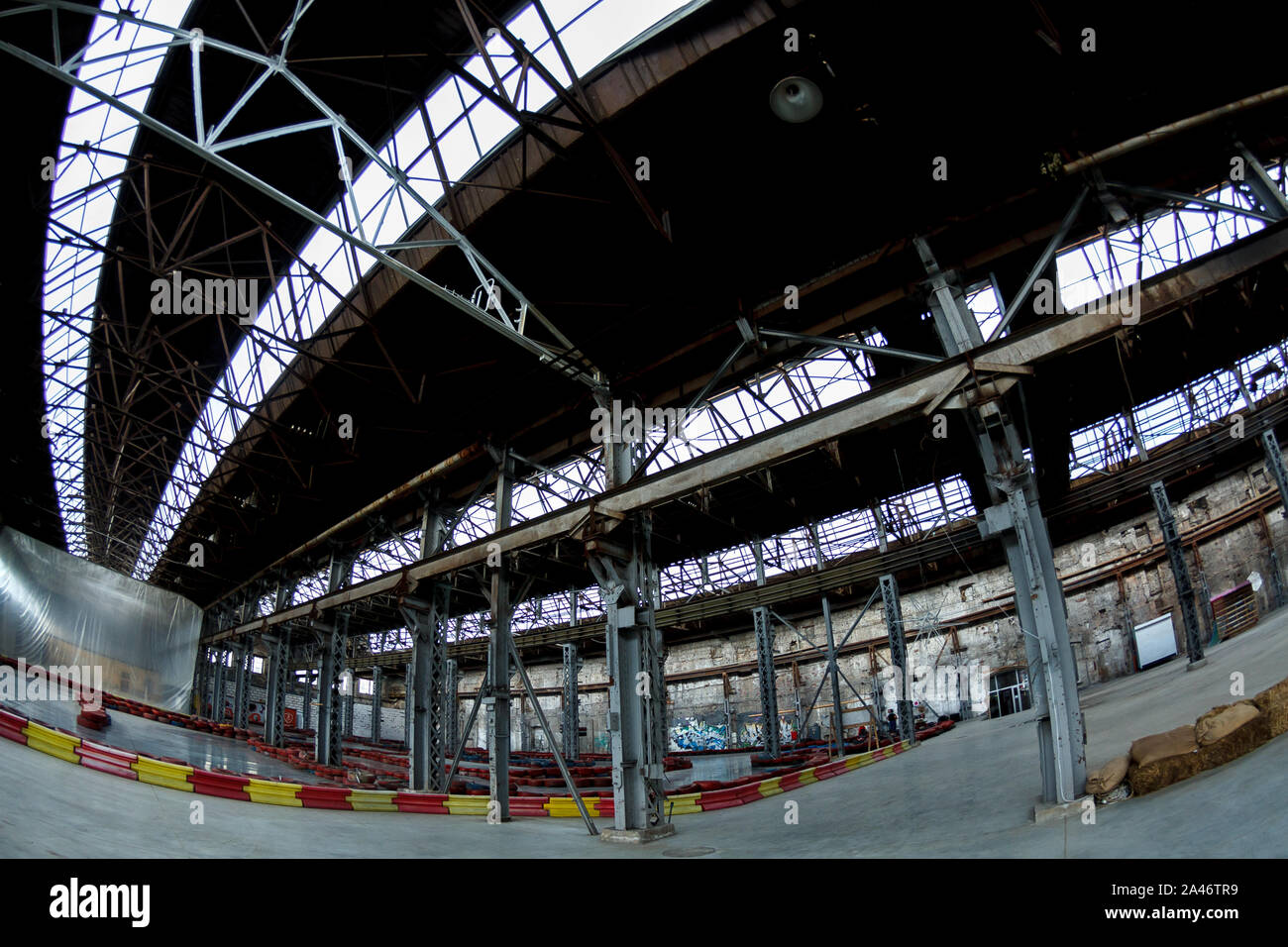 Empty factory building or warehouse building with concrete floor for industry background. Stock Photo