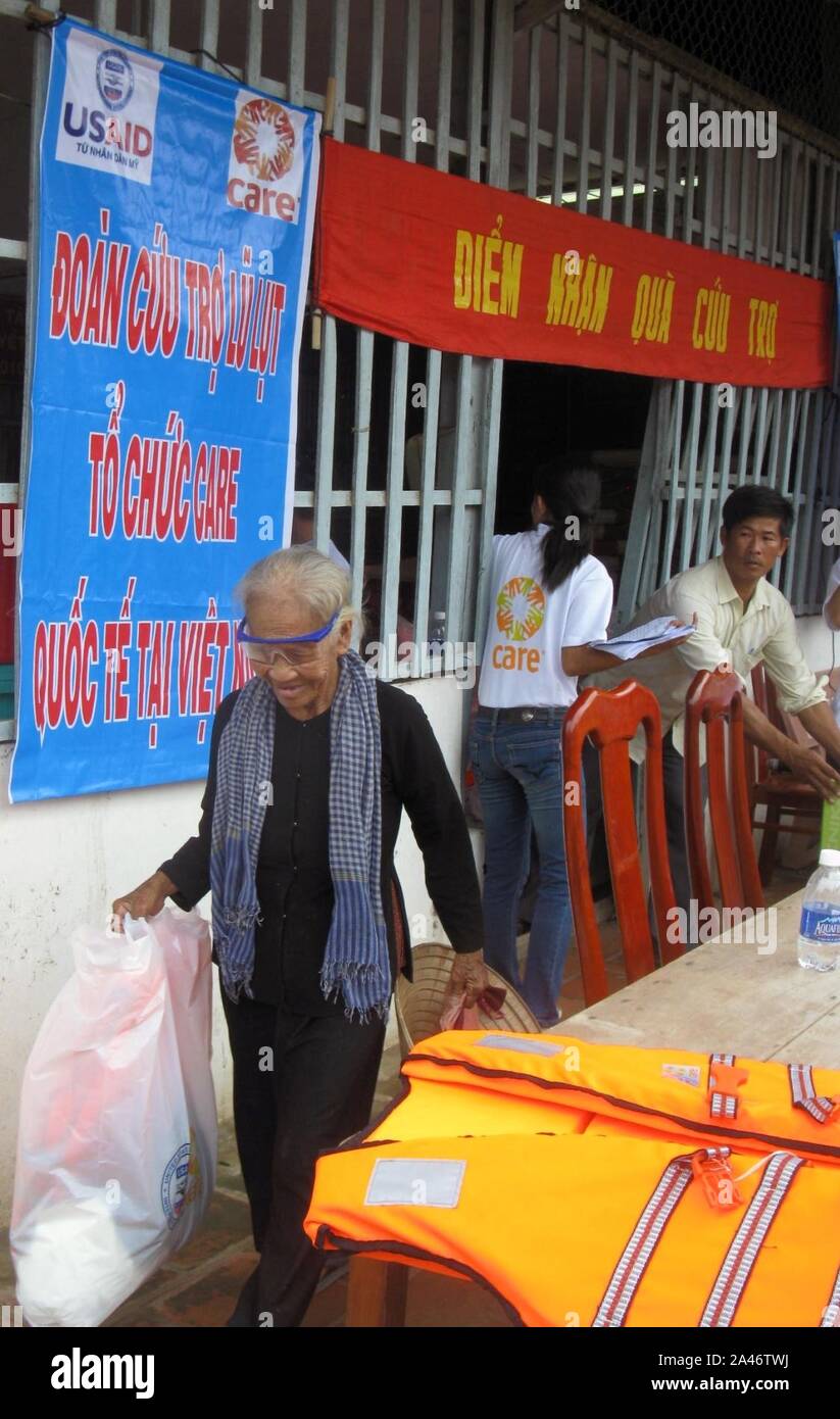 Flood Victim Receives Supplies Stock Photo Alamy
