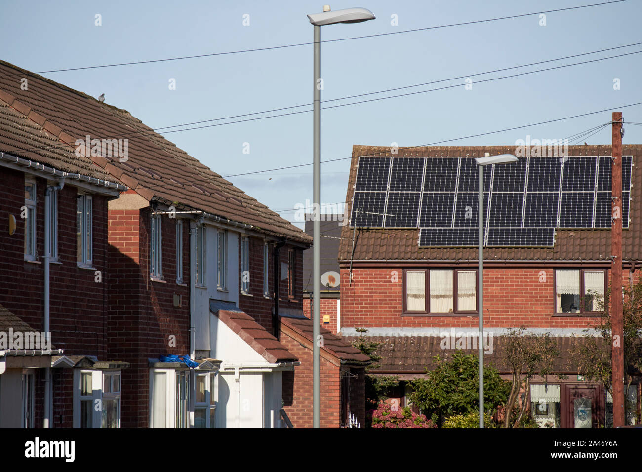 solar panels on a south facing roof of a house in a street in Liverpool England UK Stock Photo