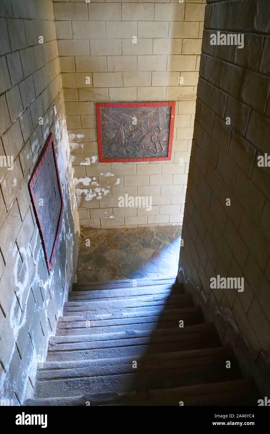 Stone rock ladder inside the beacon tower in The Qilian Mountain Scenic Area Mount Drow in Qinghai China. Stock Photo