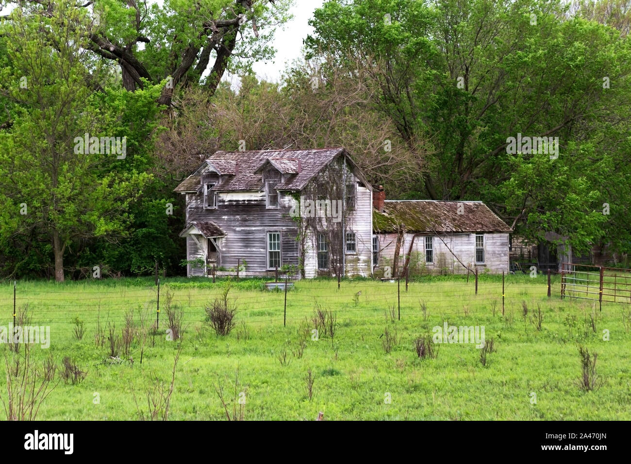 Rustic Old Farm House in the Flint Hills of Kansas Stock Photo