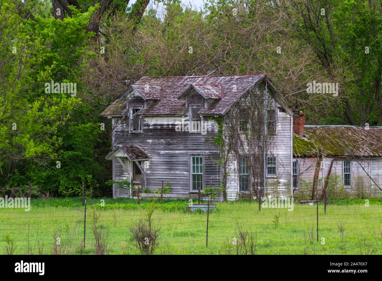 Rustic Old Farm House in the Flint Hills of Kansas Stock Photo