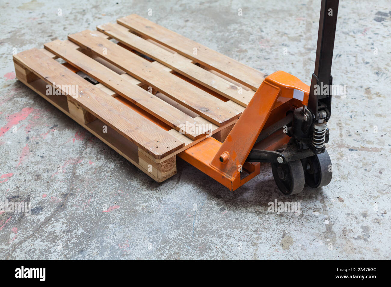 Orange pallet truck, pallet truck with empty pallet, pallet jack