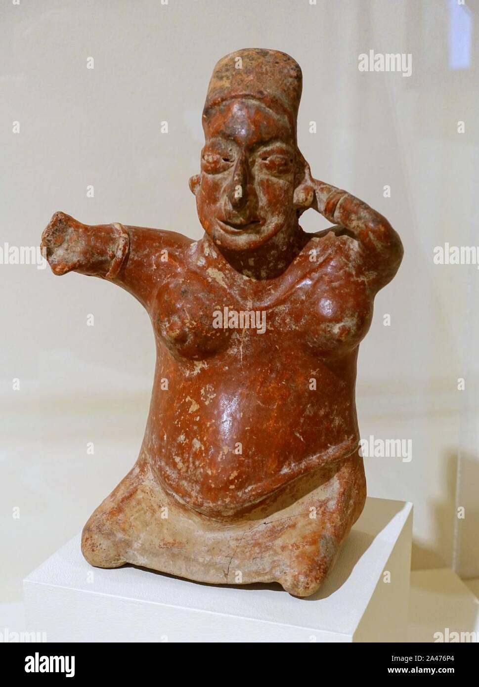 Female figure with raised arms, Nayarit, Ixtlan del Rio, Mexico, 300 BC to 200 AD, ceramic - Stock Photo