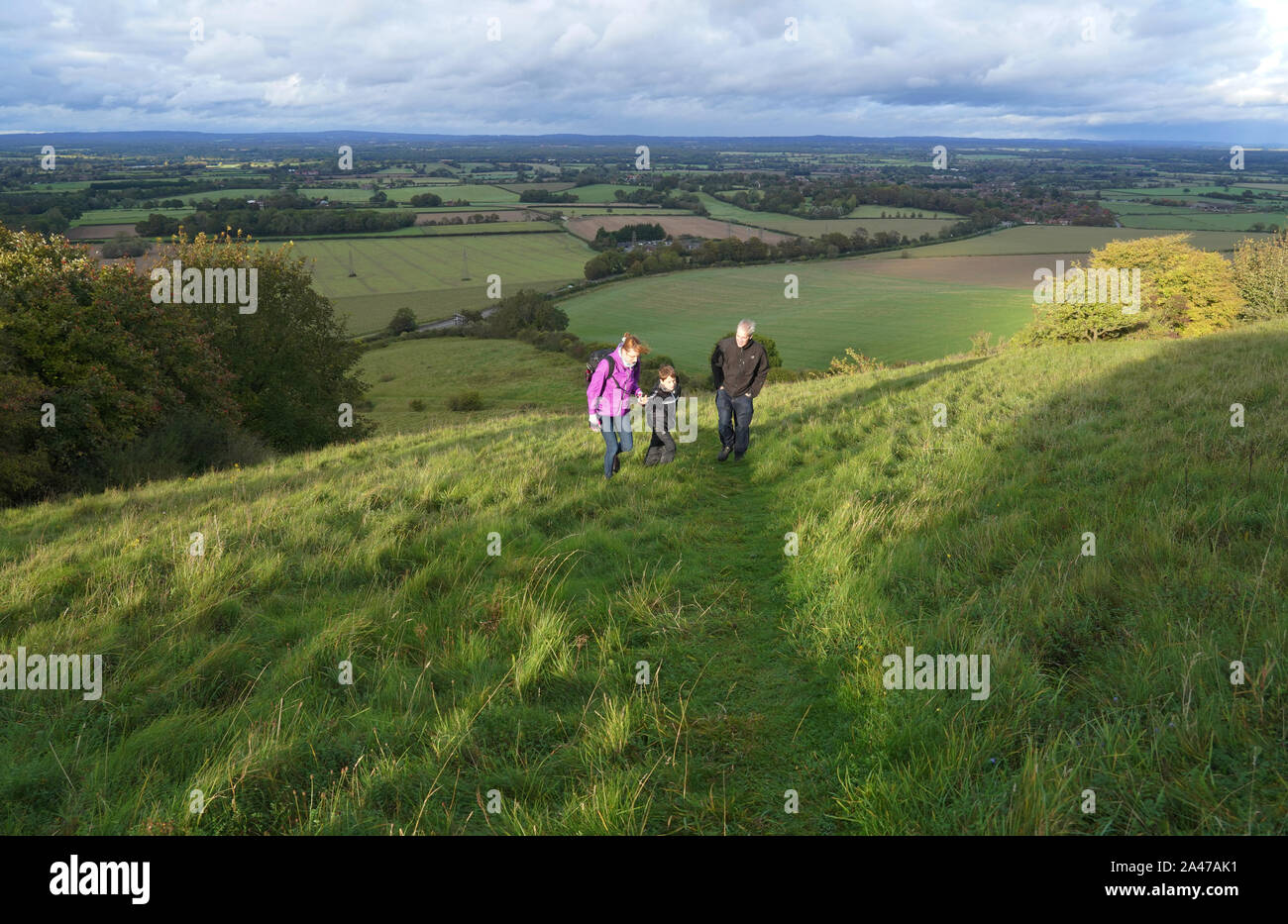 Family on a walk outdoor, Malling Down nature reserve near Lewes, East Sussex, England Stock Photo