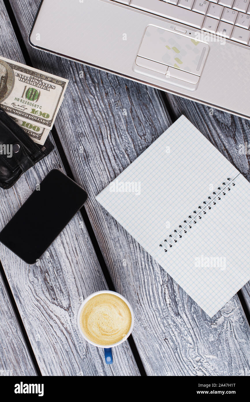 Dollar bills and office stuff Stock Photo - Alamy