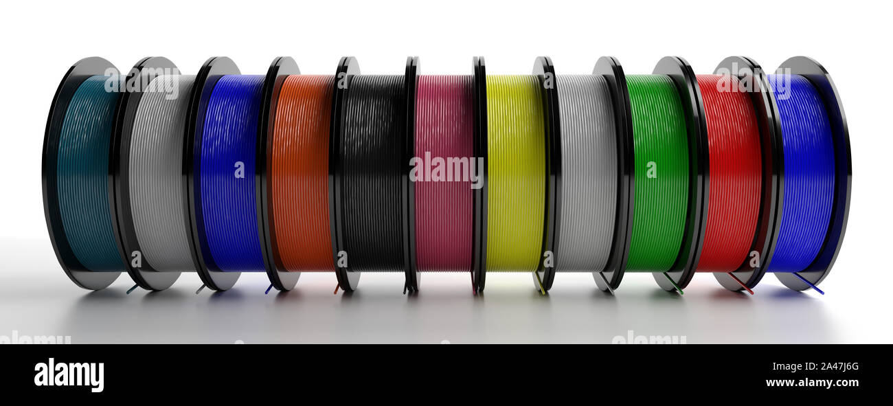 3D printer filaments. Reels of colorful plastic wire for 3D printing isolated on white background, banner. Thermoplastic coil from polylactic (pla) ac Stock Photo