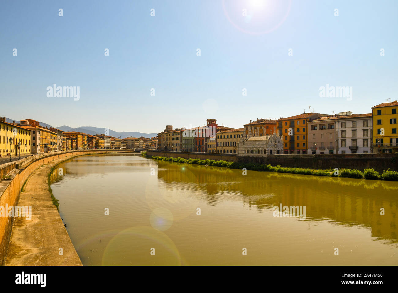 Scenic view of the Arno river from Ponte Solferino bridge with the church of Santa Maria della Spina in a sunny summer day, Pisa, Tuscany, Italy Stock Photo