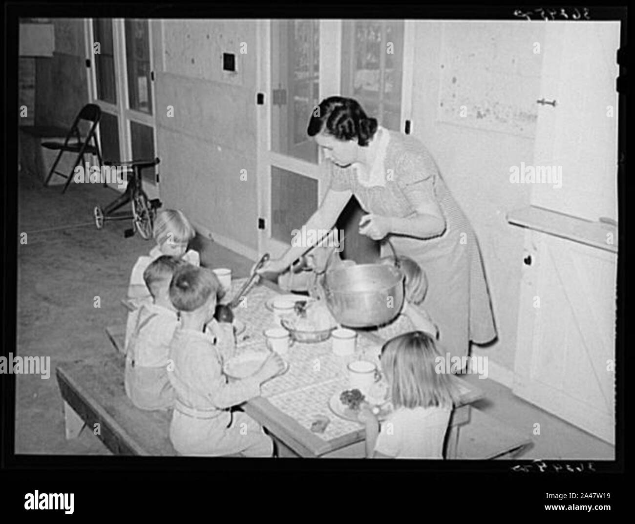 Female Worker in WPA Lunchroom Great Depression Era. Stock Photo