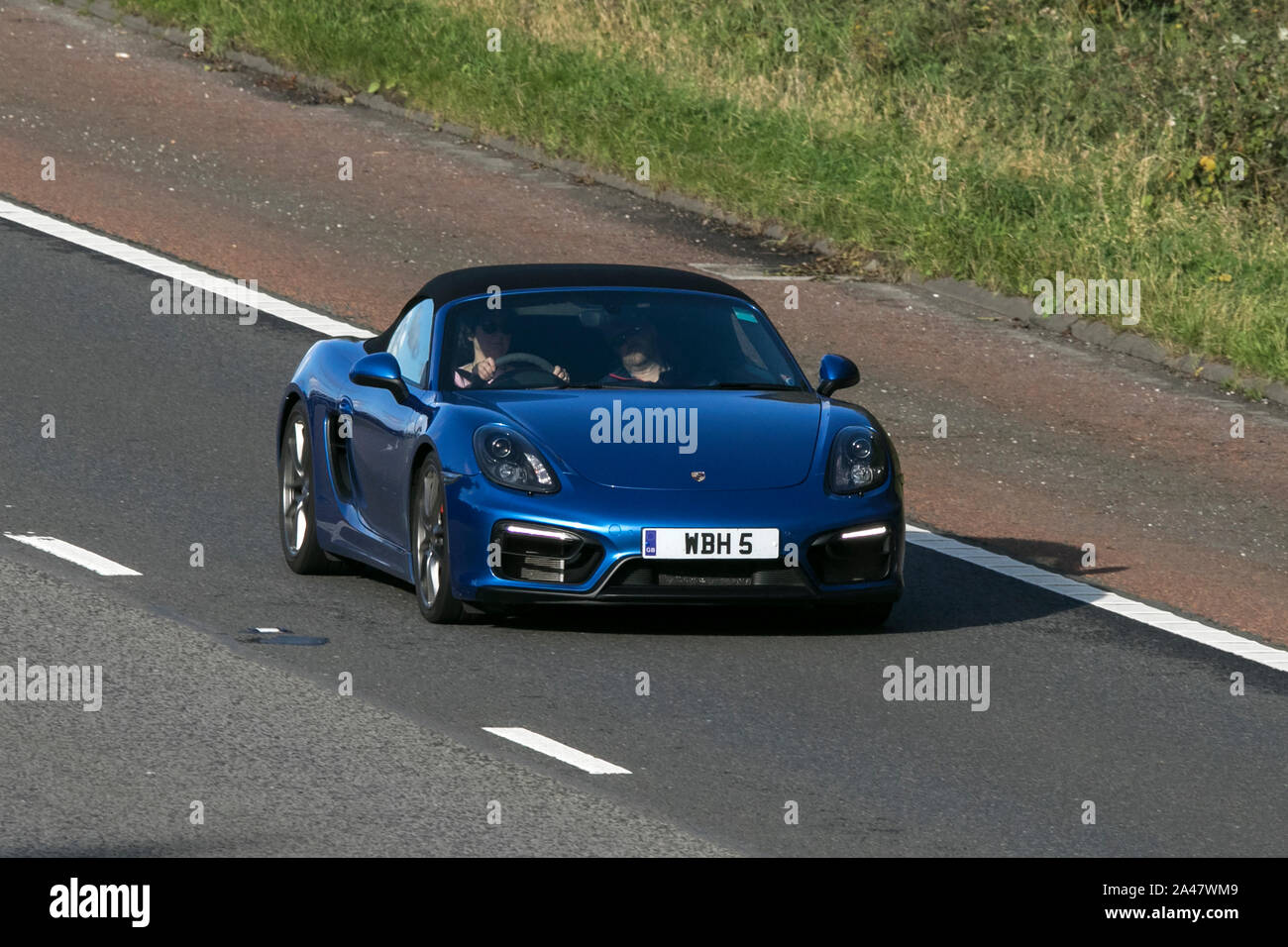 2015 blue Porsche Boxster GTS S-A, with private number plate, personalised, cherished, dateless, DVLA registration marks, registrations on the M6. Stock Photo