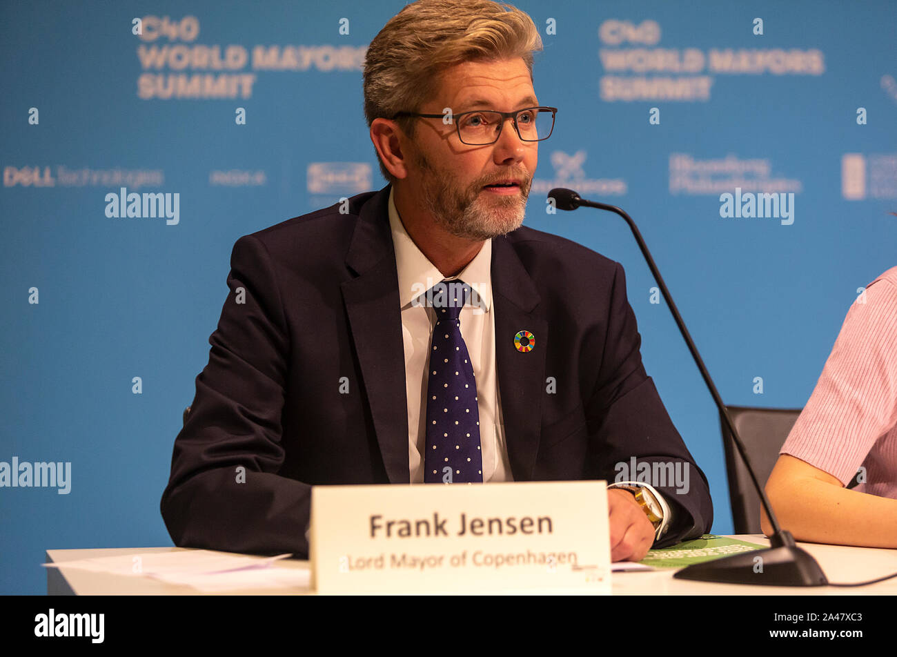 COPENHAGEN, DENMARK – OCTOBER 11, 2019:  Frank Jensen, Lord Mayor of Copenhagen, Denmark, speaks at the ‘Mayors and Youth Activist’ press conference at the C40 World Mayors Summit. During the press conference young activist explained what they expect of the grown-up politicians. More than 90 mayors of some of the world’s largest and most influential cities representing some 700 million people meet in Copenhagen from October 9-12 for the C40 World Mayors Summit. The purpose with the summit in Copenhagen is to build a global coalition of leading cities, businesses and citizens that rallies aroun Stock Photo